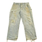Vintage 1990s Carhartt Distressed Sun Faded Denim Work Jeans Men's 37 x 30 from propervintagecanada