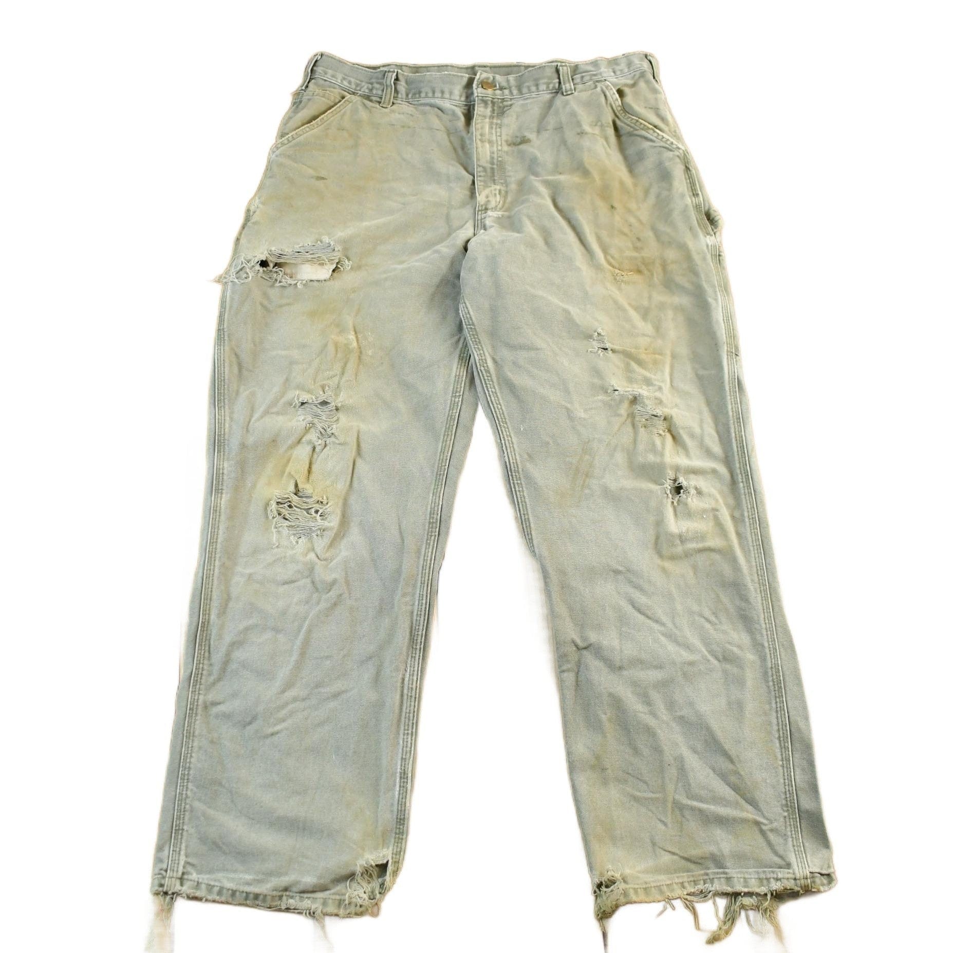 Vintage 1990s Carhartt Distressed Sun Faded Denim Work Jeans Men's 37 x 30 from propervintagecanada