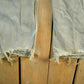 Vintage 1990s Carhartt Distressed Sun Faded Denim Work Jeans Men's 37 x 30 from propervintagecanada
