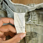 Vintage 1990s Carhartt Distressed Sun Faded Denim Work Jeans Men's 37 x 30 from propervintagecanada