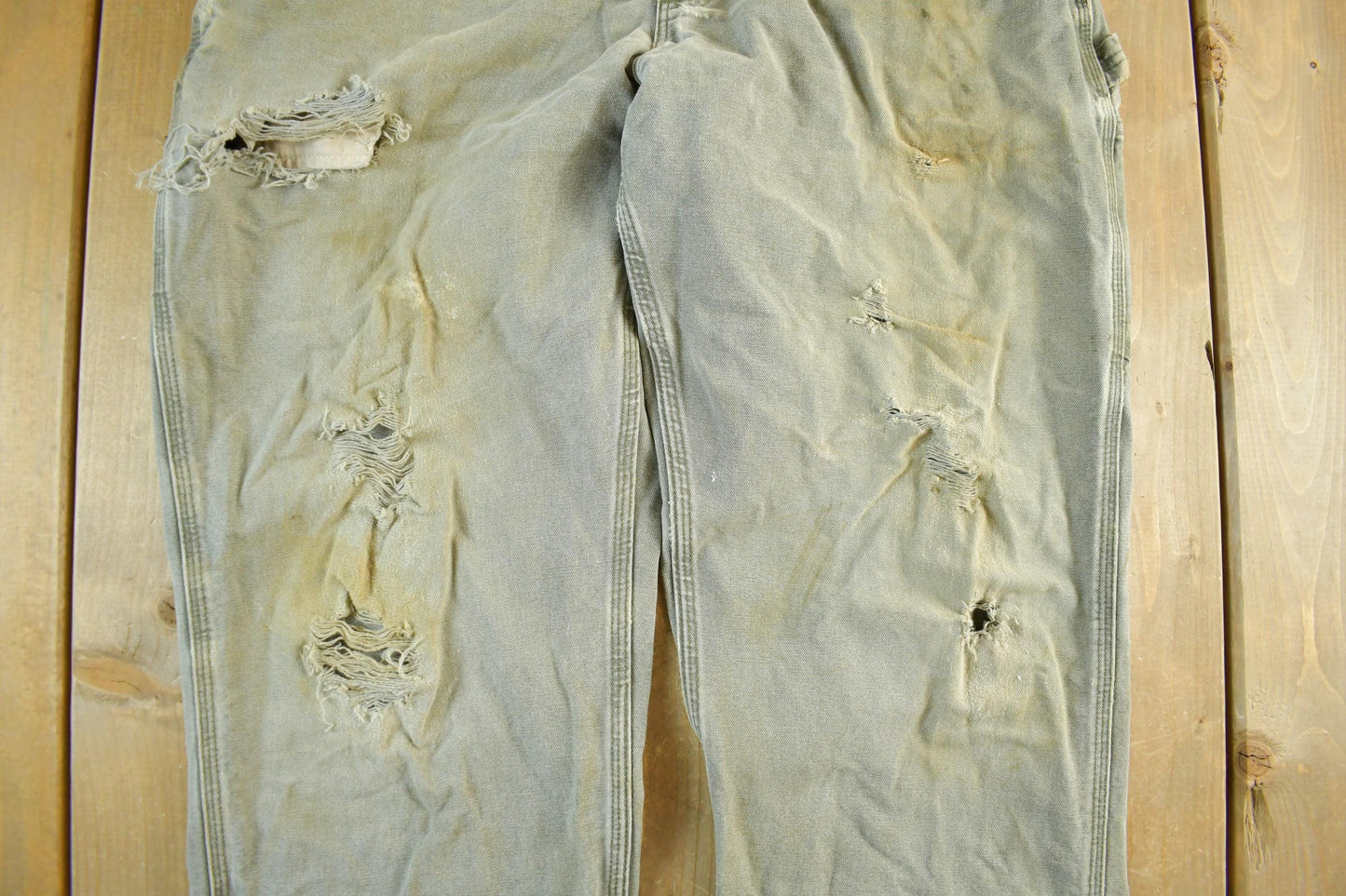 Vintage 1990s Carhartt Distressed Sun Faded Denim Work Jeans Men's 37 x 30 from propervintagecanada