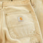 Vintage 1990s Carhartt Distressed Sun Faded Double Knee Pants Men's 30 x 29 from propervintagecanada