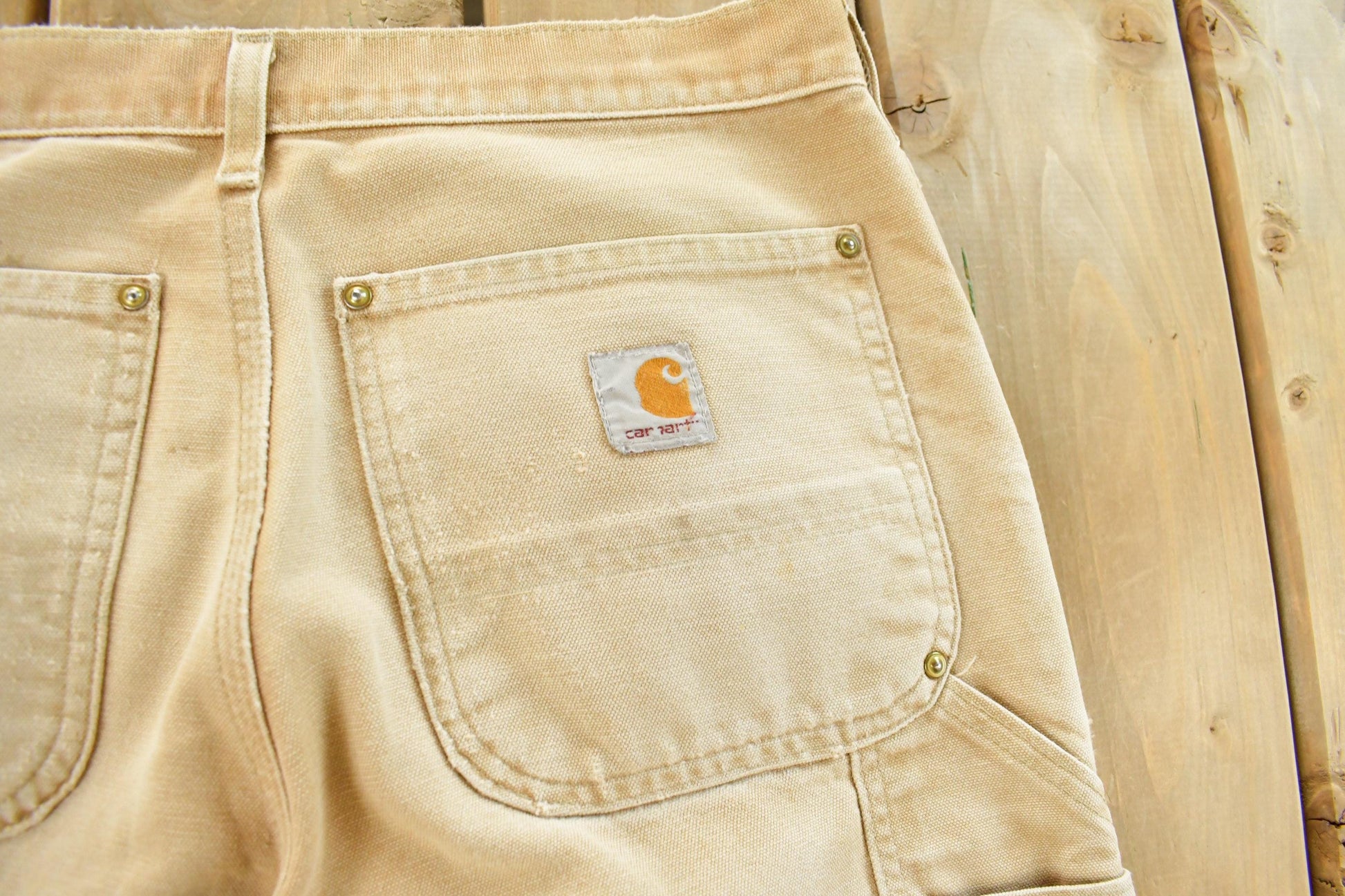 Vintage 1990s Carhartt Distressed Sun Faded Double Knee Pants Men's 30 x 29 from propervintagecanada