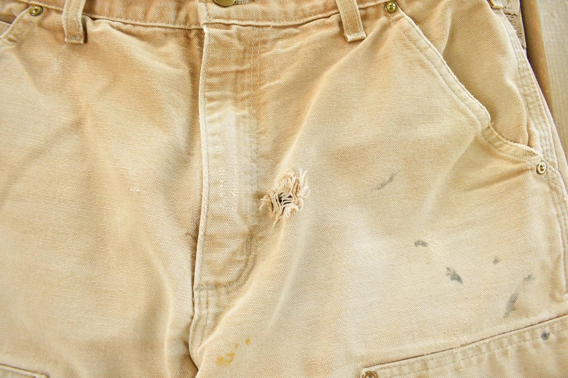 Vintage 1990s Carhartt Distressed Sun Faded Double Knee Pants Men's 30 x 29 from propervintagecanada