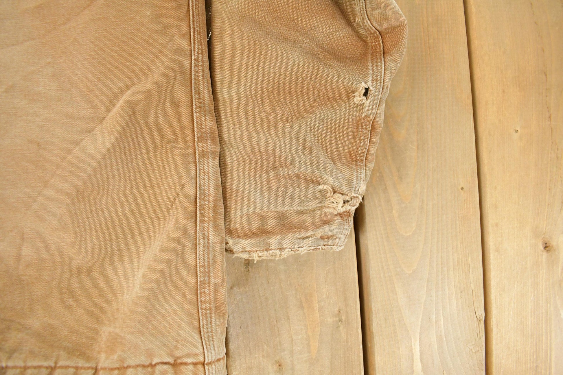 Vintage 1990s Carhartt Distressed Work Jacket Youth Large from propervintagecanada
