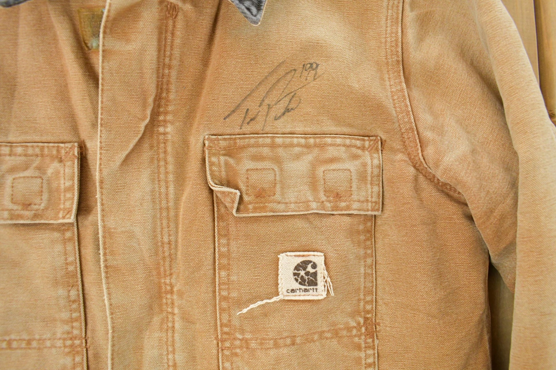 Vintage 1990s Carhartt Distressed Work Jacket Youth Large from propervintagecanada