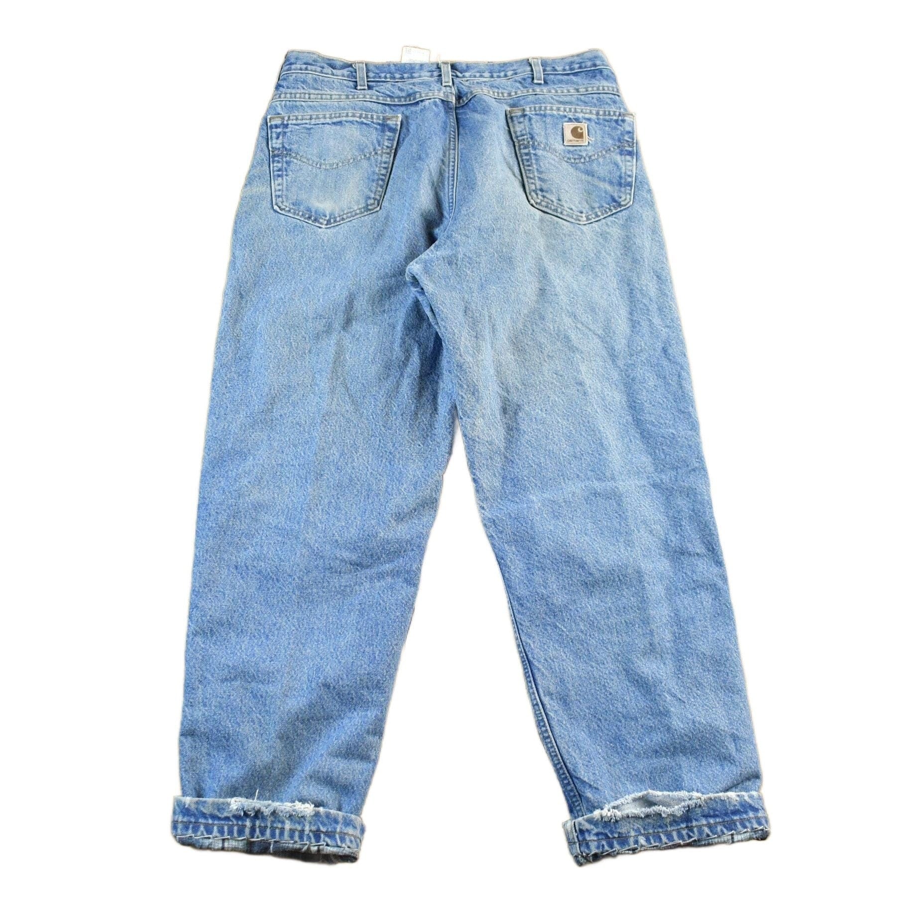 Vintage 1990s Carhartt Flannel Lined Denim Work Jeans Men's 36 x 30 from propervintagecanada