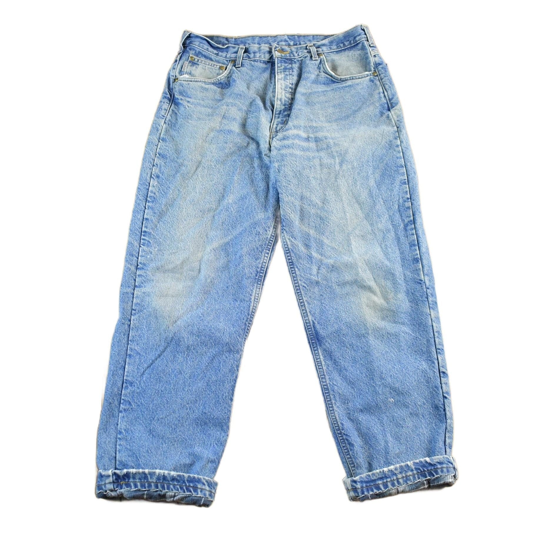 Vintage 1990s Carhartt Flannel Lined Denim Work Jeans Men's 36 x 30 from propervintagecanada