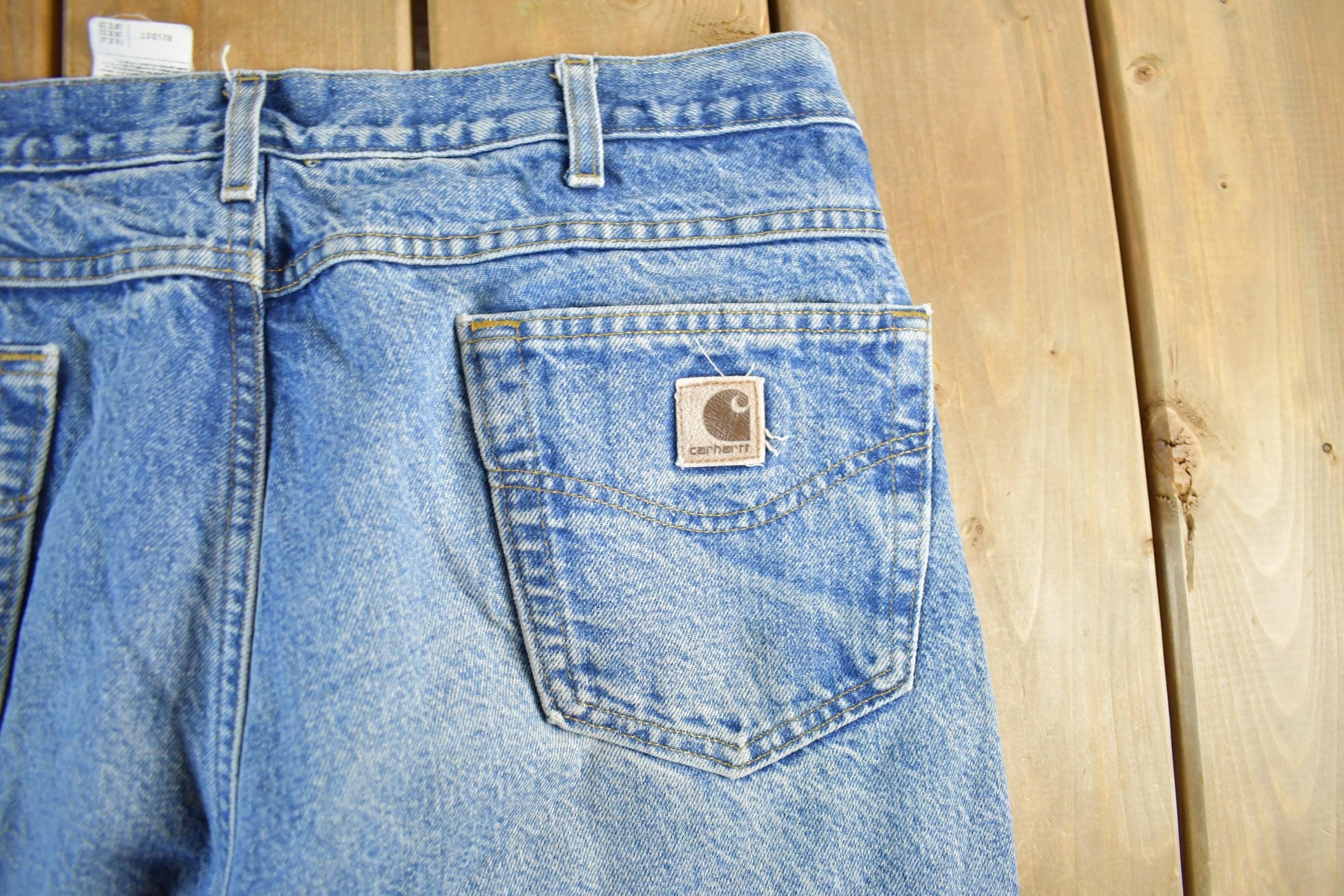 Vintage 1990s Carhartt Flannel Lined Denim Work Jeans Men's 36 x 30 from propervintagecanada