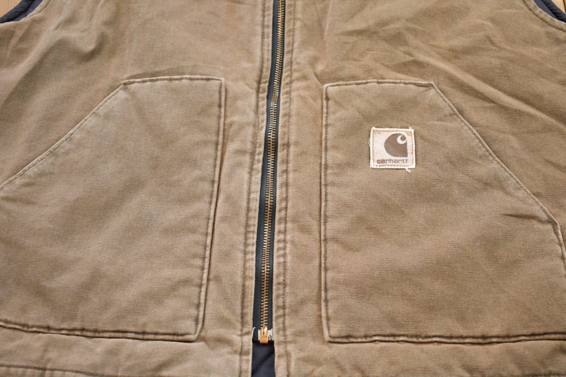Vintage 1990s Carhartt Full Zip Insulated Vest Men's 3XL from propervintagecanada