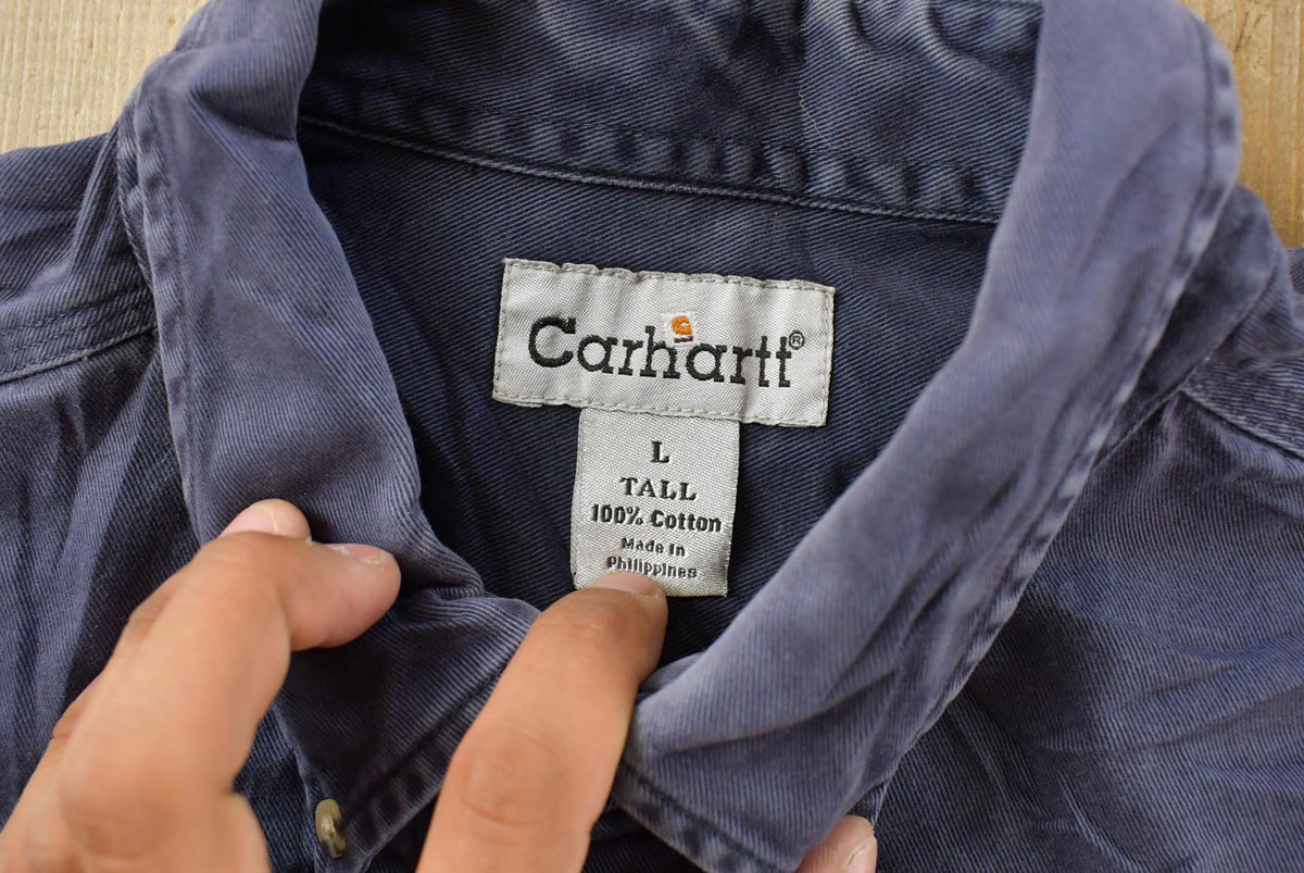 Vintage 1990s Carhartt Heavyweight Workwear Button Up Shirt Men's Tall Large from propervintagecanada