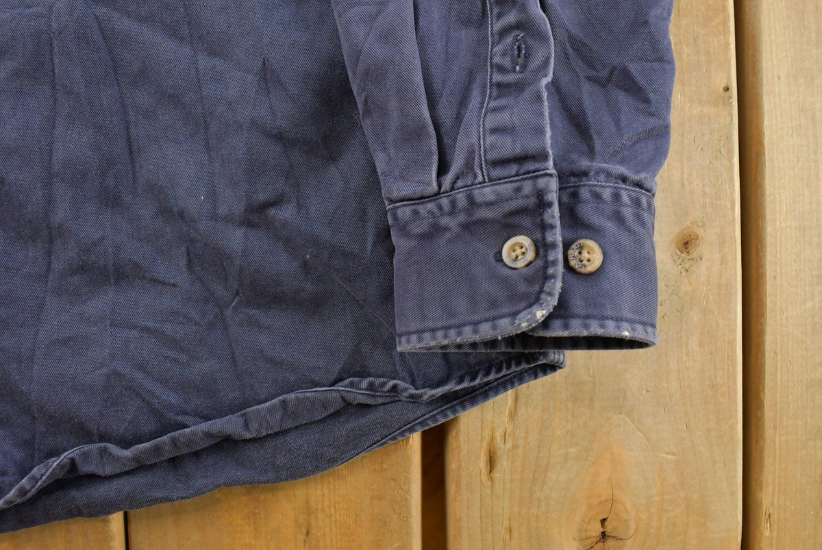 Vintage 1990s Carhartt Heavyweight Workwear Button Up Shirt Men's Tall Large from propervintagecanada