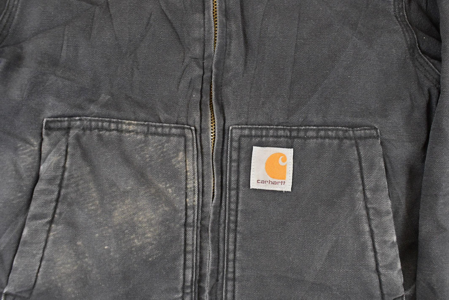 Vintage 1990s Carhartt Hooded Distressed Work Jacket Youth XS from propervintagecanada