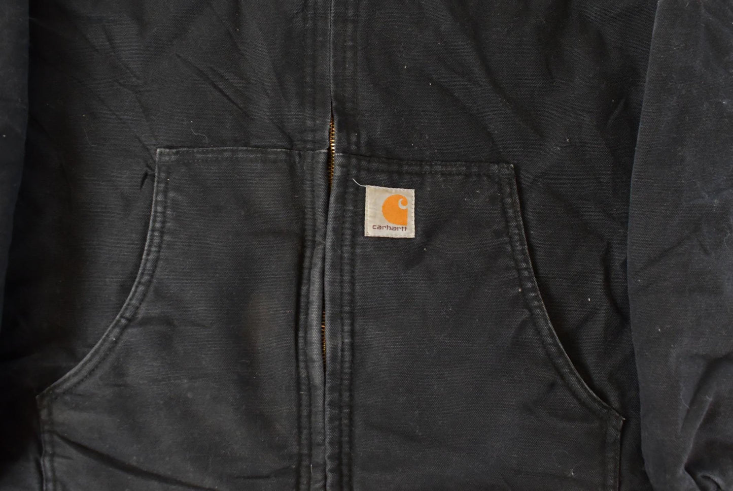 Vintage 1990s Carhartt Hooded Jacket Youth XL Men's XL/ Distressed Sun Faded / Black Workwear Coat from propervintagecanada