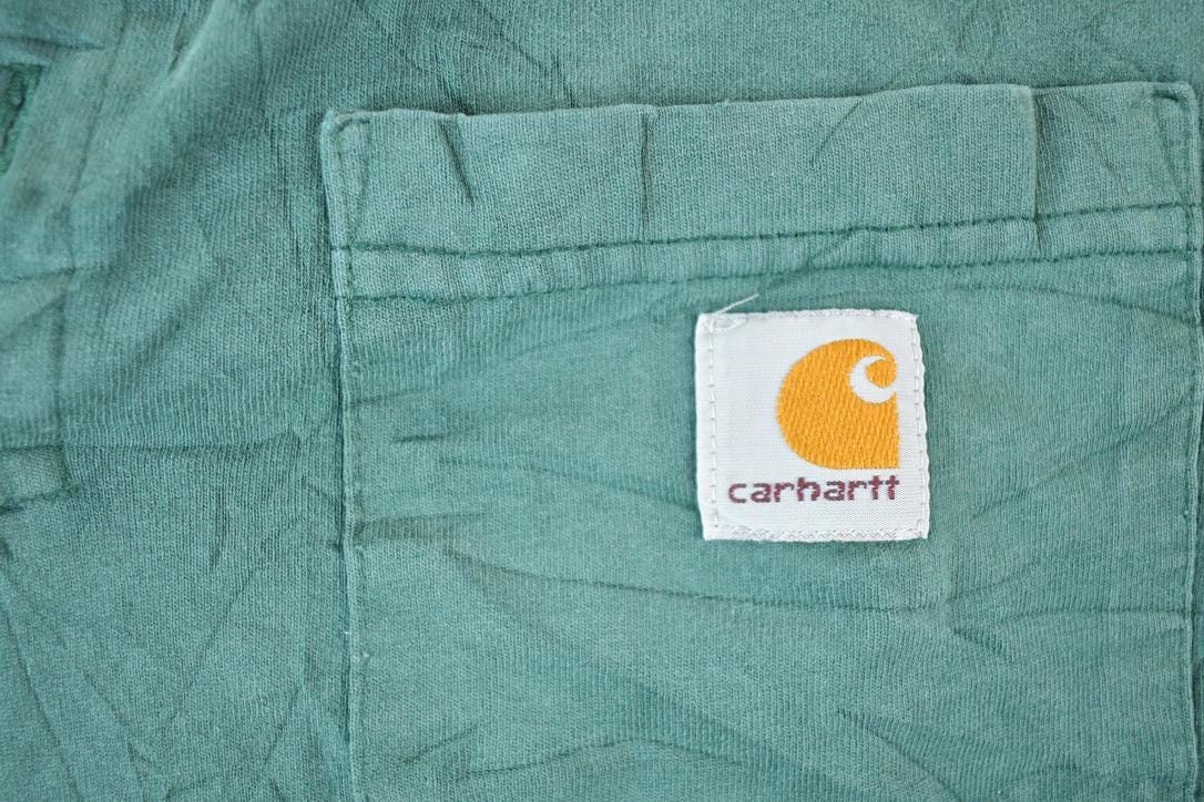 Vintage 1990s Carhartt Long Sleeve Workwear Souvenir Single Stitch T-Shirt Made In USA Men's Medium from propervintagecanada