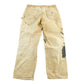 Vintage 1990s Carhartt Paint Distressed Double Knee Denim Work Jeans Men's Medium 34 x 29 from propervintagecanada