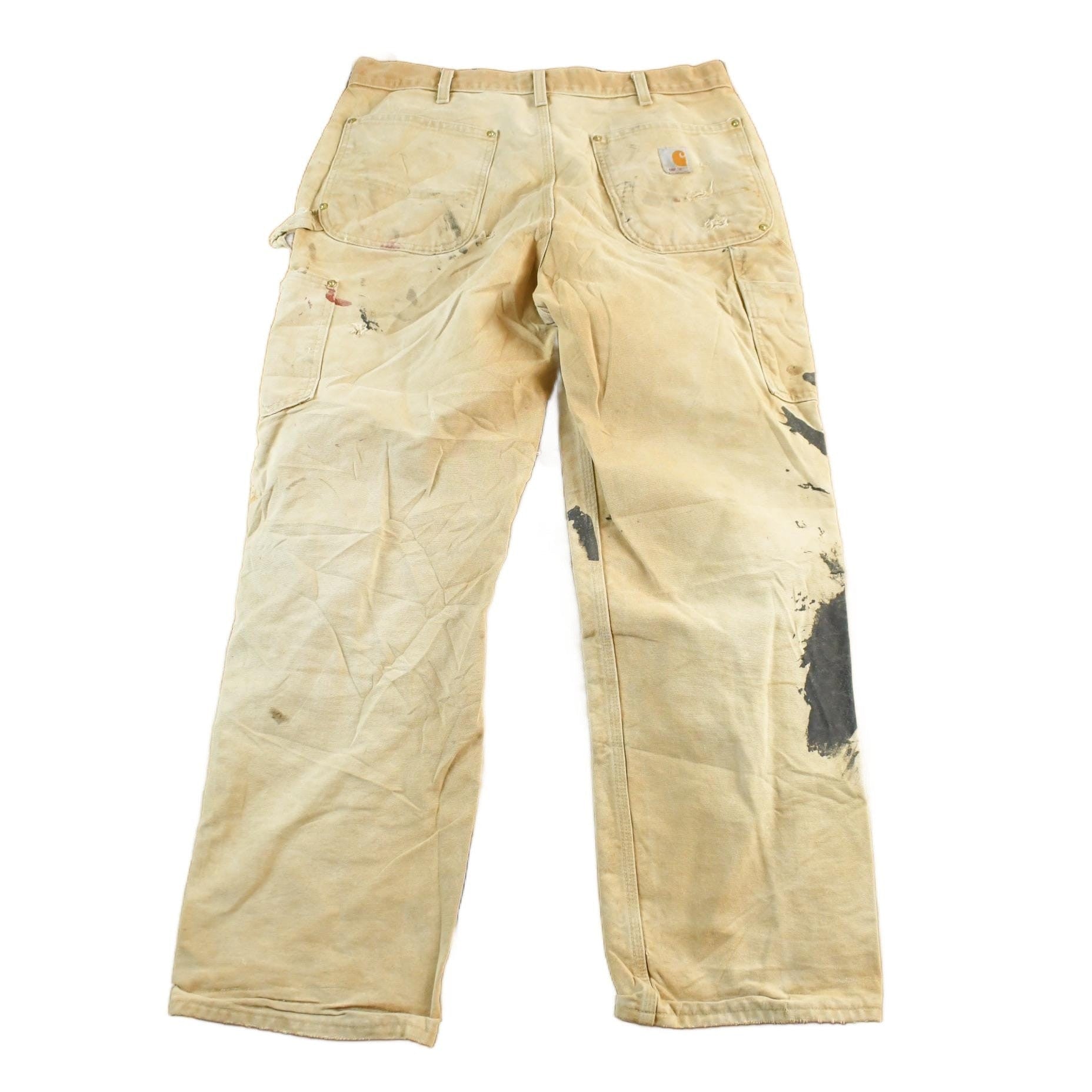 Vintage 1990s Carhartt Paint Distressed Double Knee Denim Work Jeans Men's Medium 34 x 29 from propervintagecanada