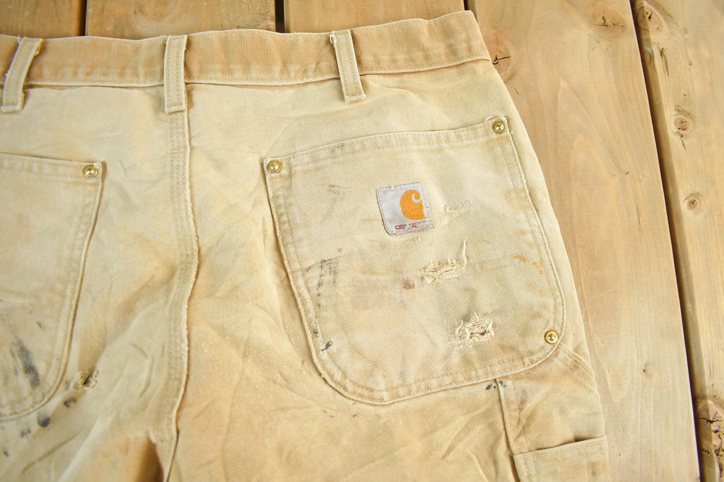 Vintage 1990s Carhartt Paint Distressed Double Knee Denim Work Jeans Men's Medium 34 x 29 from propervintagecanada