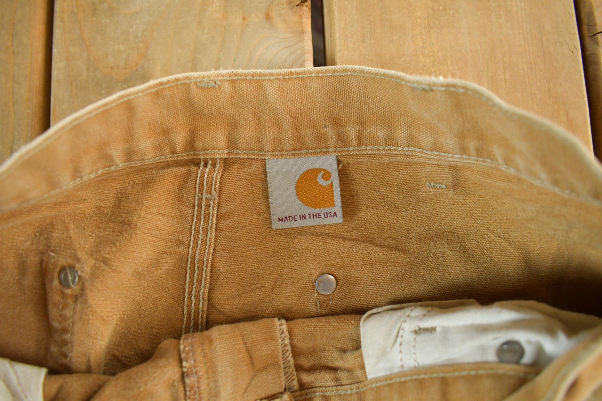 Vintage 1990s Carhartt Paint Distressed Double Knee Denim Work Jeans Men's Medium 34 x 29 from propervintagecanada
