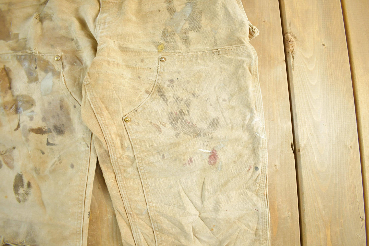 Vintage 1990s Carhartt Paint Distressed Double Knee Denim Work Jeans Men's Medium 34 x 29 from propervintagecanada