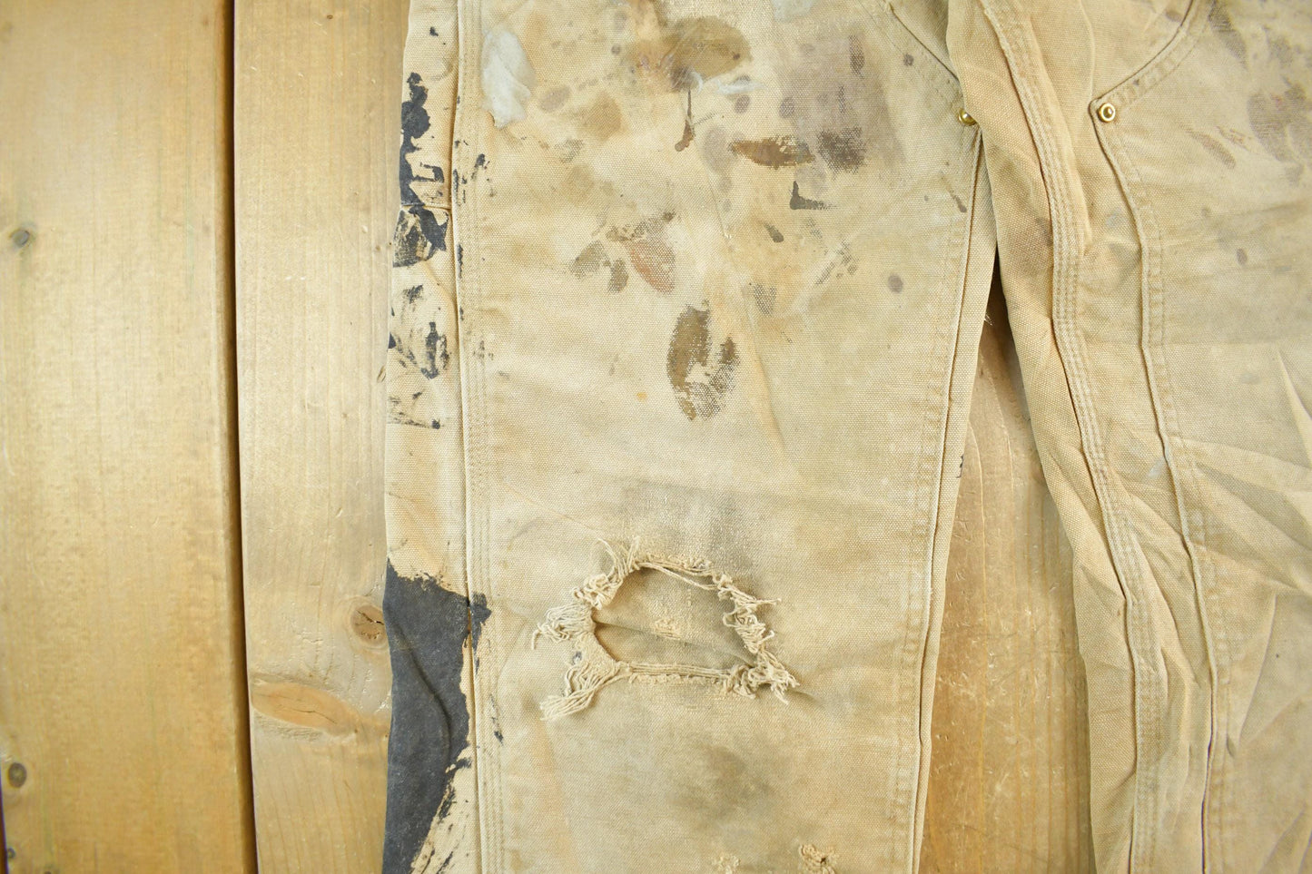Vintage 1990s Carhartt Paint Distressed Double Knee Denim Work Jeans Men's Medium 34 x 29 from propervintagecanada