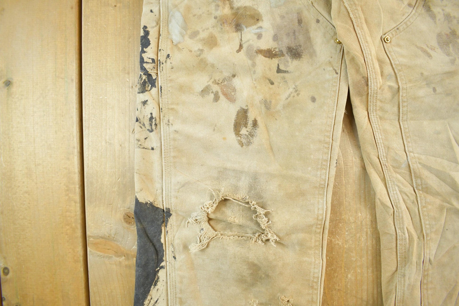 Vintage 1990s Carhartt Paint Distressed Double Knee Denim Work Jeans Men's Medium 34 x 29 from propervintagecanada