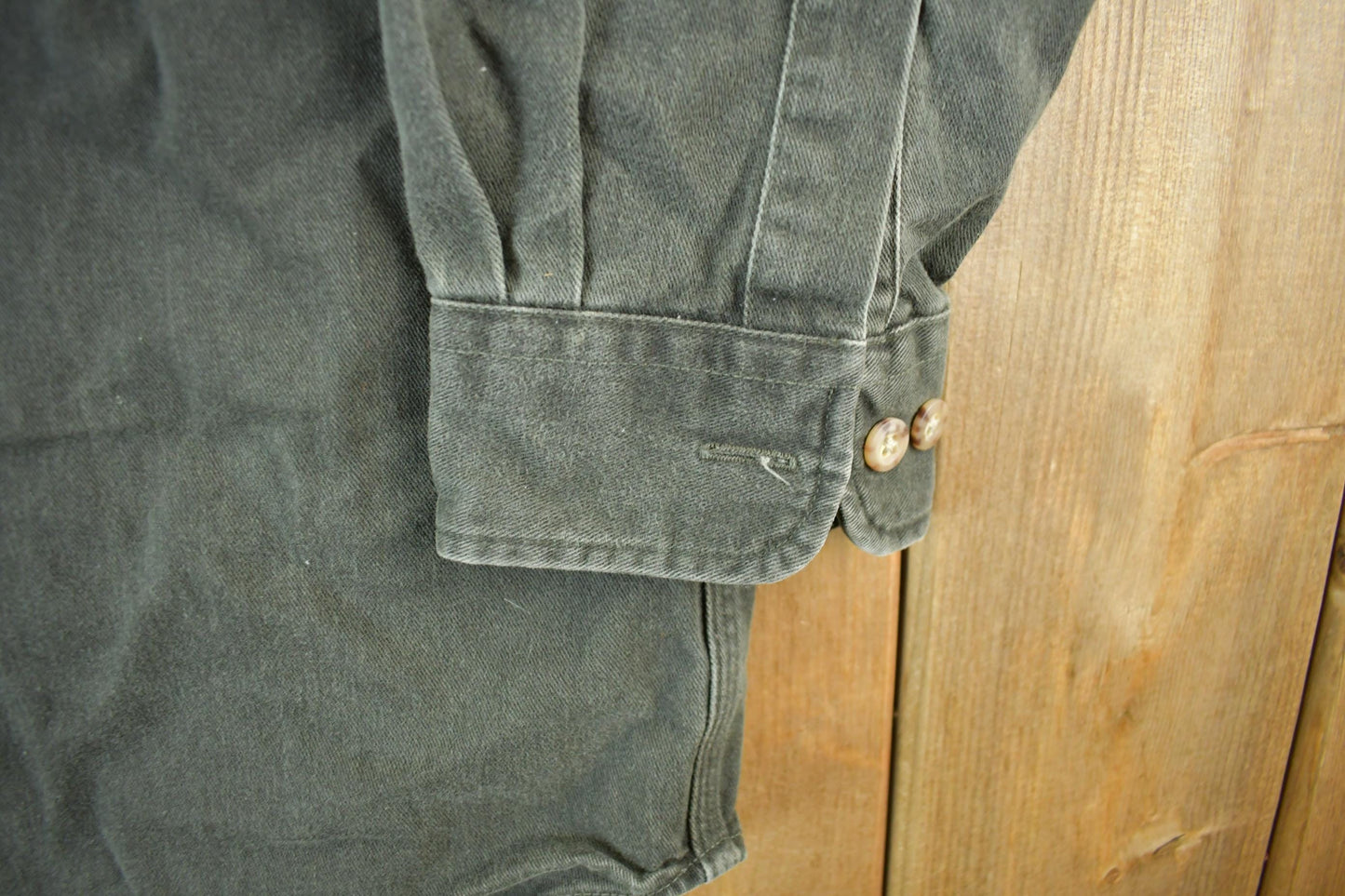 Vintage 1990s Carhartt Sun Faded Button Up Shirt Men's L from propervintagecanada