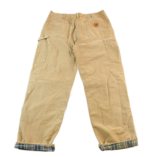 Vintage 1990s Carhartt Tan Canvas Blanket Lined Work Pants Men's Medium 34 x 30 from propervintagecanada