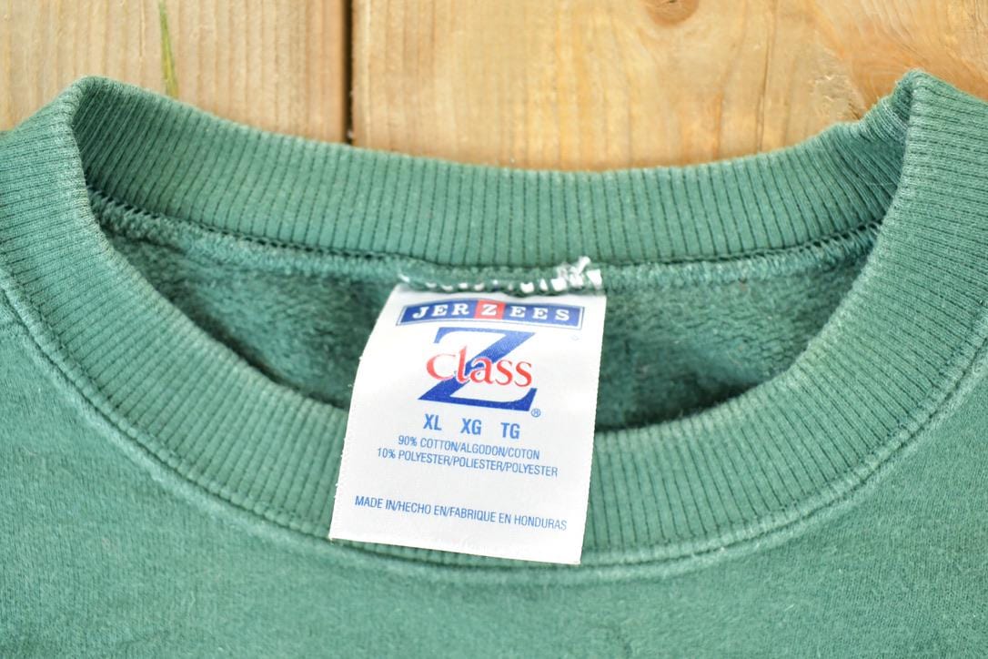 Vintage 1990s Cayuga Feather Logo Souvenir Heavyweight Crewneck Sweatshirt Men's XL from propervintagecanada