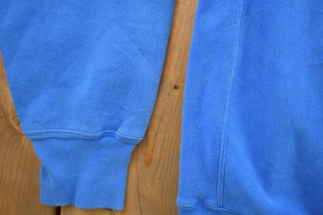 Vintage 1990s Cedar Rapids Champion Reverse Weave Crewneck Sweatshirt Men's Large from propervintagecanada