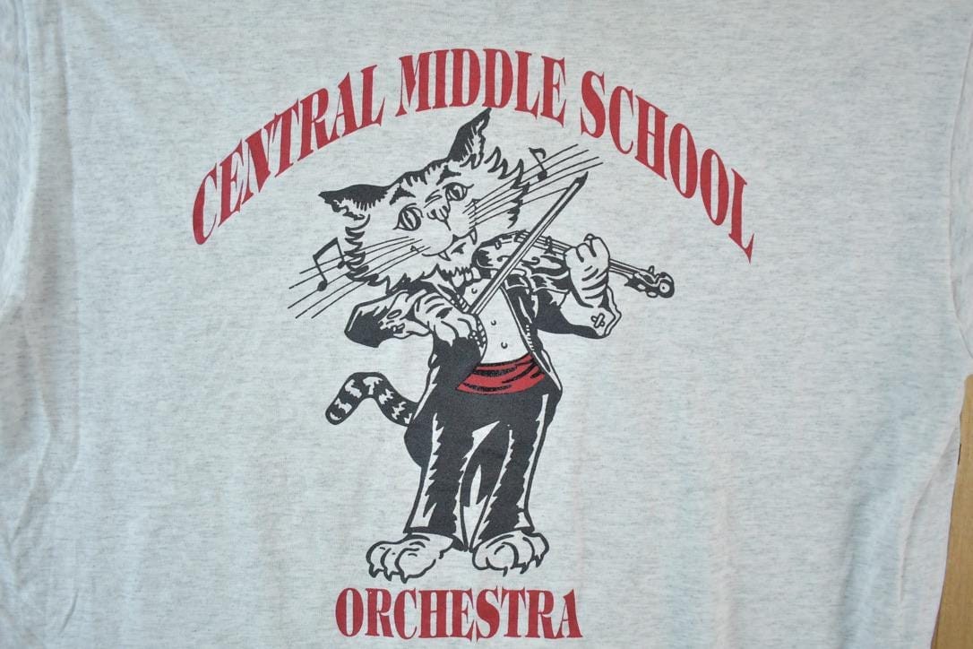 Vintage 1990s Central Middle School Orchestra Souvenir Single Stitch Graphic Print T-Shirt Men's Large from propervintagecanada