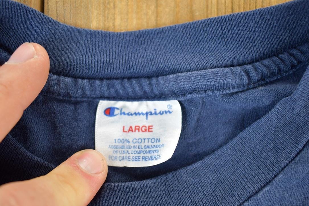 Vintage 1990s Champion American Flag Souvenir Single Stitch Graphic Print T-Shirt Men's XL from propervintagecanada