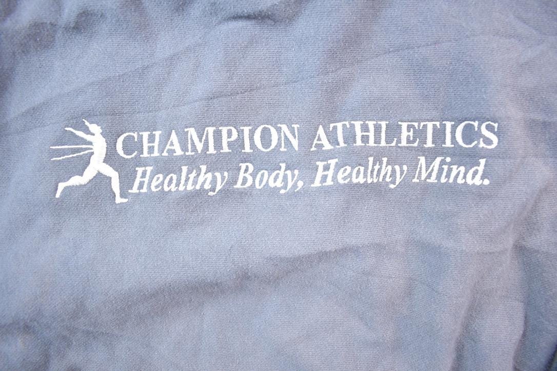 Vintage 1990s Champion Athletic Club Reverse Weave Hoodie Sweatshirt Men's Small from propervintagecanada