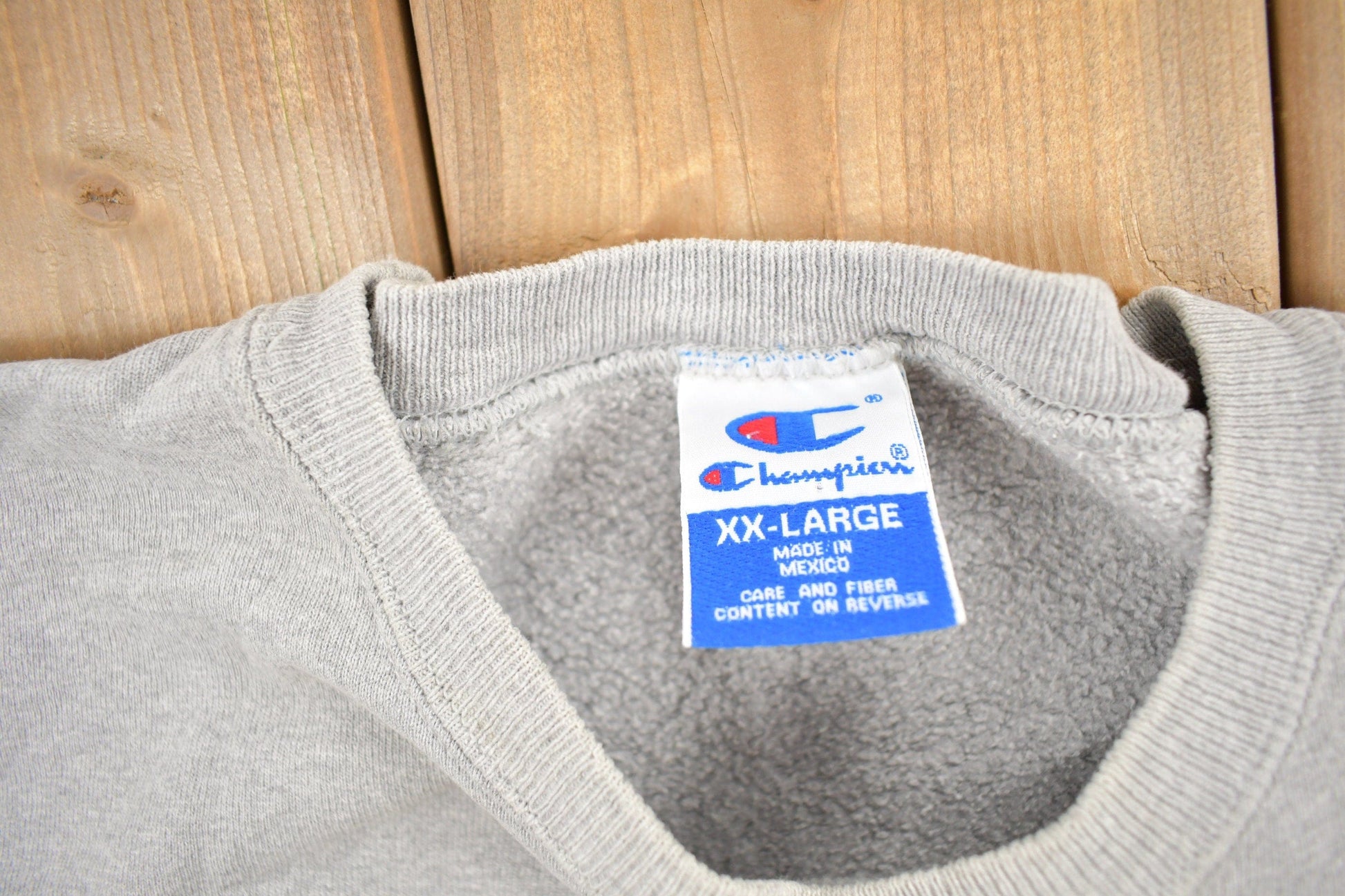 Vintage 1990s Champion Blank Grey Crewneck Sweatshirt Men's 2XL from propervintagecanada