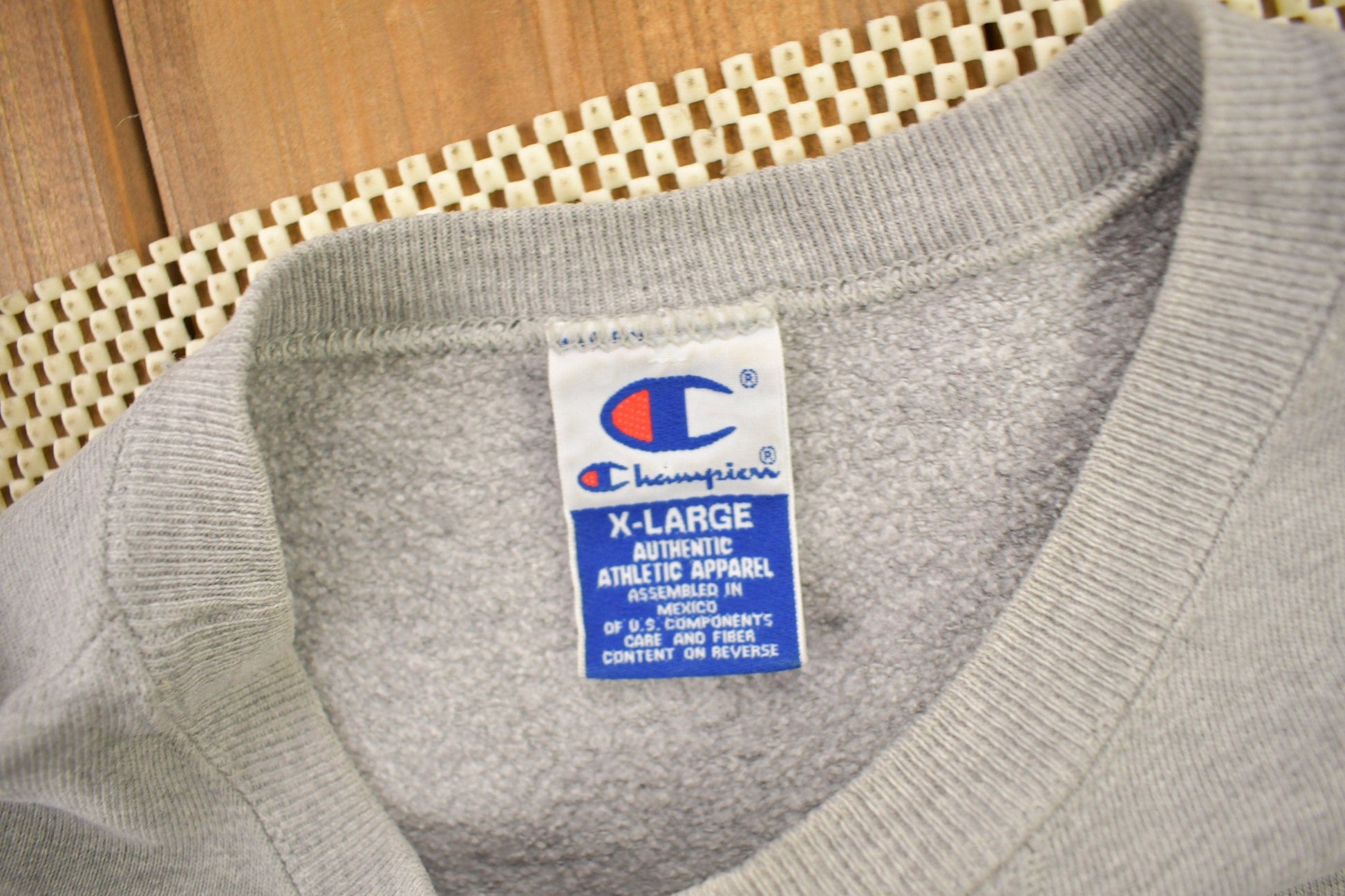 Vintage 1990s Champion Blank Grey Crewneck Sweatshirt Men's XL from propervintagecanada