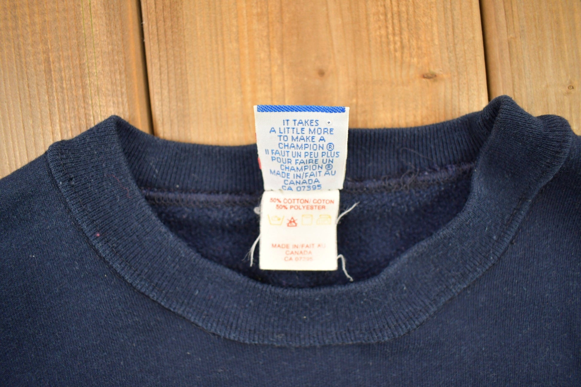 Vintage 1990s Champion Blank Navy Crewneck Sweatshirt Men's Large from propervintagecanada