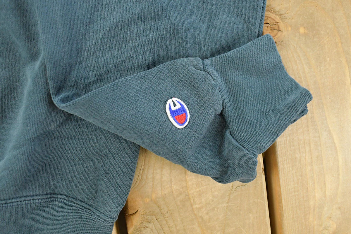 Vintage 1990s Champion Embroidered Crewneck Sweatshirt Men's Large from propervintagecanada