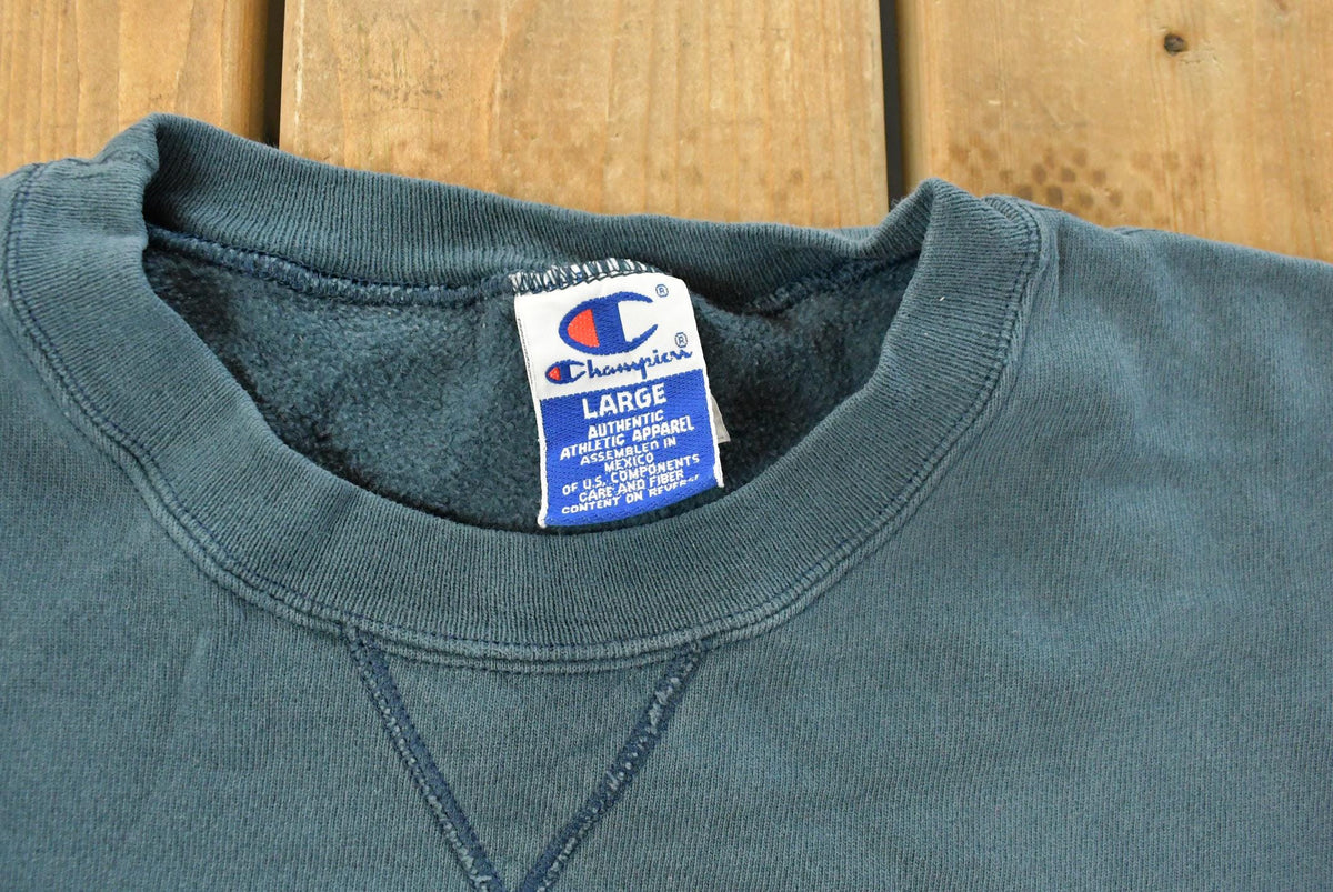 Vintage 1990s Champion Embroidered Crewneck Sweatshirt Men's Large from propervintagecanada