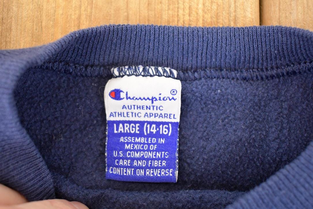 Vintage 1990s Champion Graphic Print Crewneck Sweatshirt Youth L from propervintagecanada