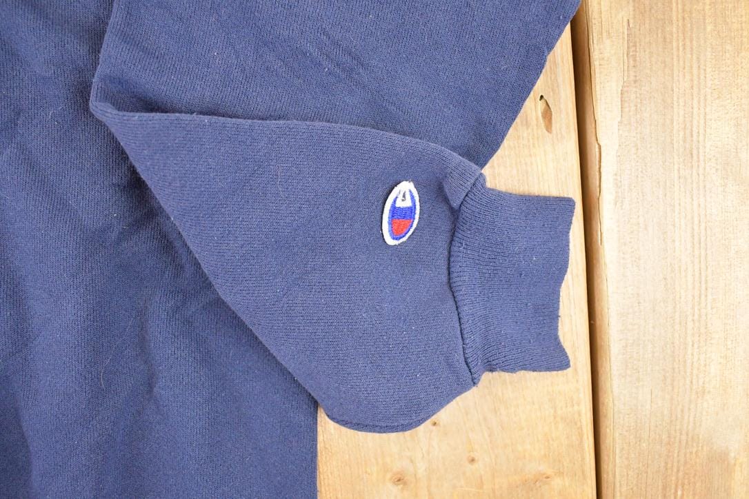 Vintage 1990s Champion Graphic Print Crewneck Sweatshirt Youth L from propervintagecanada