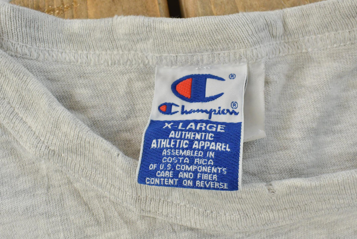Vintage 1990s Champion Graphic Tank Top Men's XL from propervintagecanada