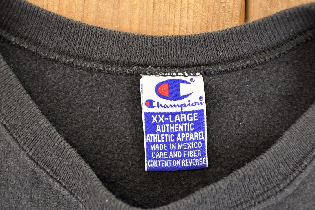 Vintage 1990s Champion Iowa Hawkeyes University Crewneck Sweater Mens XL from propervintagecanada