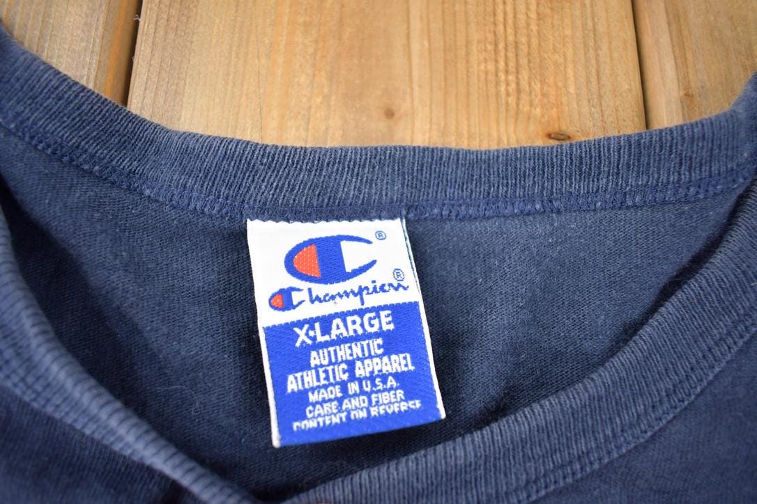 Vintage 1990s Champion North Carolina Basketball University Collegiate Graphic Tank Top Men's XL from propervintagecanada