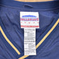 Vintage 1990s Champion Notre Dame Graphic Windbreaker Jacket Men's 2XL from propervintagecanada