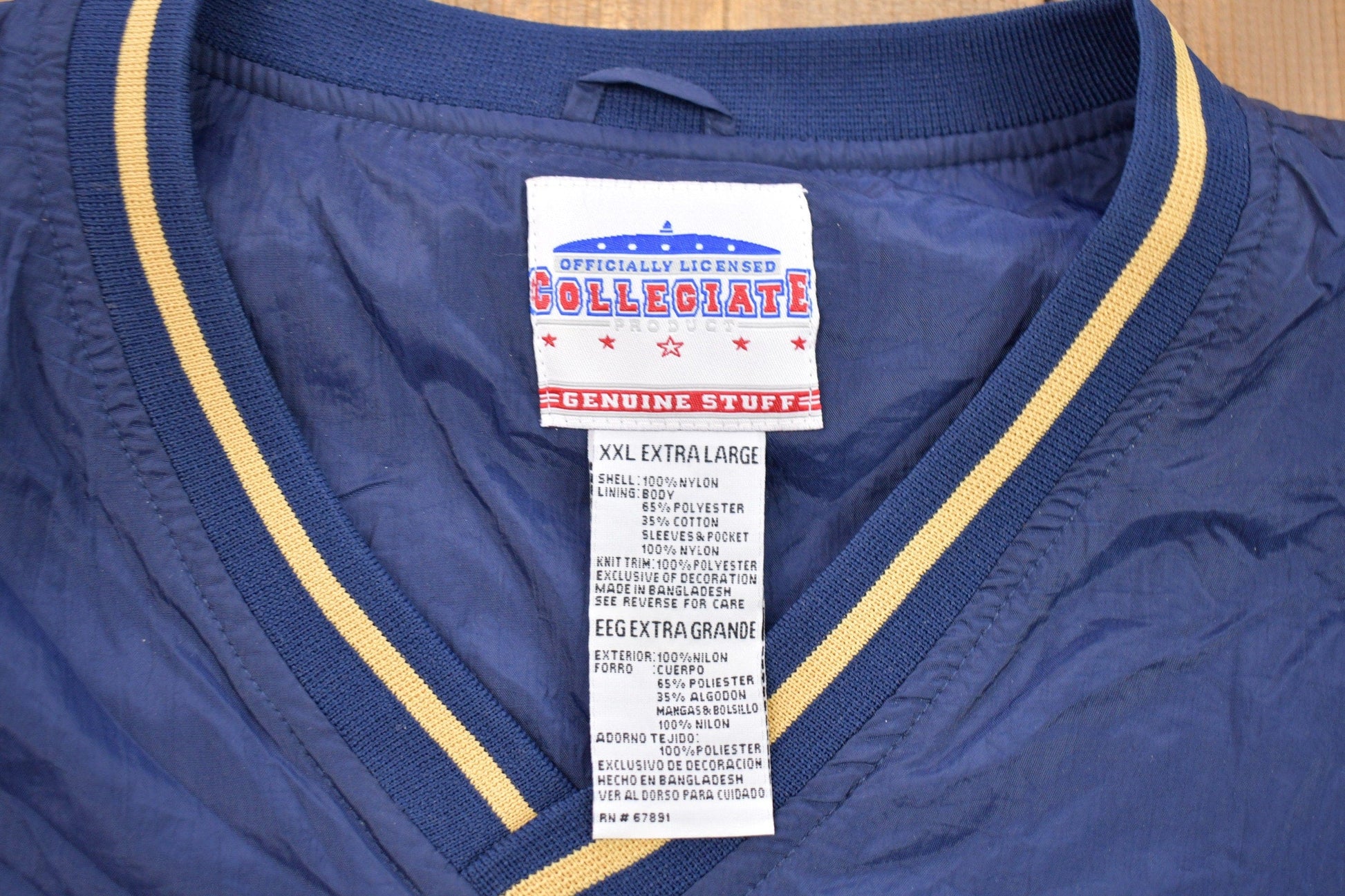 Vintage 1990s Champion Notre Dame Graphic Windbreaker Jacket Men's 2XL from propervintagecanada