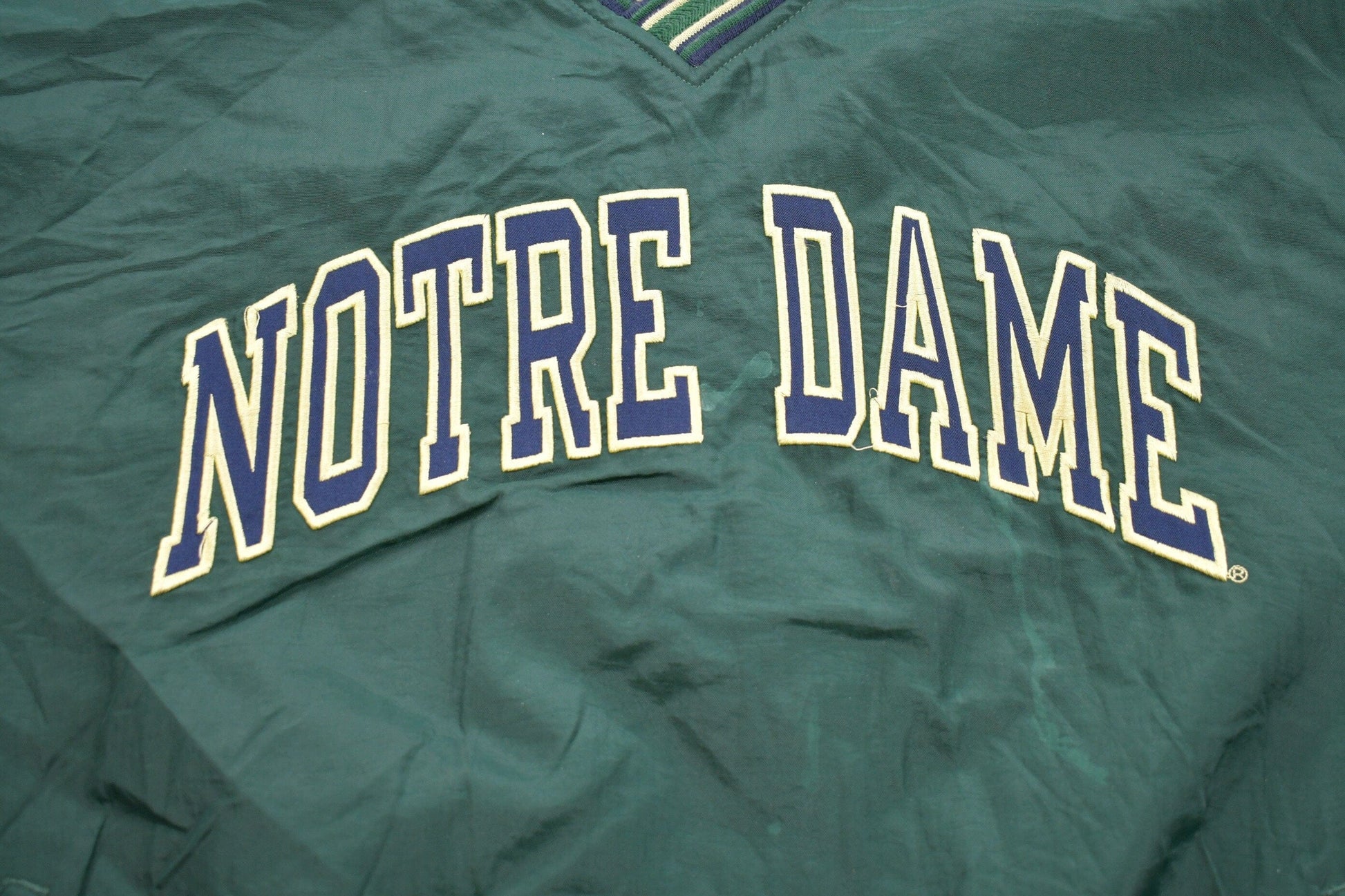 Vintage 1990s Champion Notre Dame Graphic Windbreaker Jacket Men's 2XL from propervintagecanada