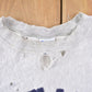 Vintage 1990s Champion Reverse Weave Distressed John Carroll Sweatshirt Men's Large from propervintagecanada