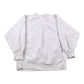 Vintage 1990s Champion Reverse Weave Distressed John Carroll Sweatshirt Men's Large from propervintagecanada
