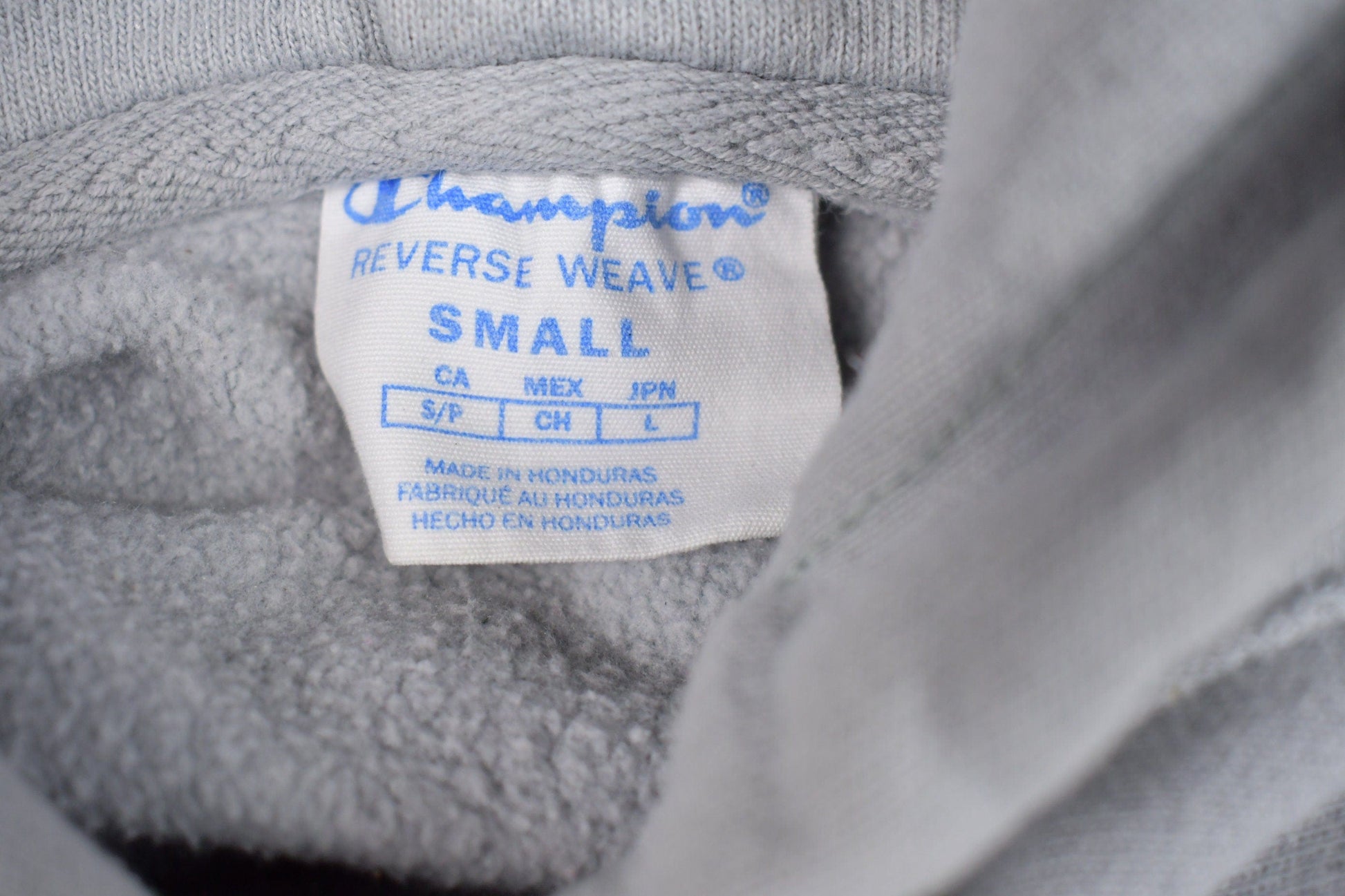 Vintage 1990s Champion Reverse Weave Hooded Sweatshirt Men's Small from propervintagecanada
