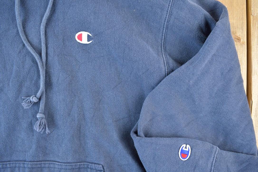 Vintage 1990s Champion Reverse Weave Hoodie Sweatshirt Men's Large from propervintagecanada